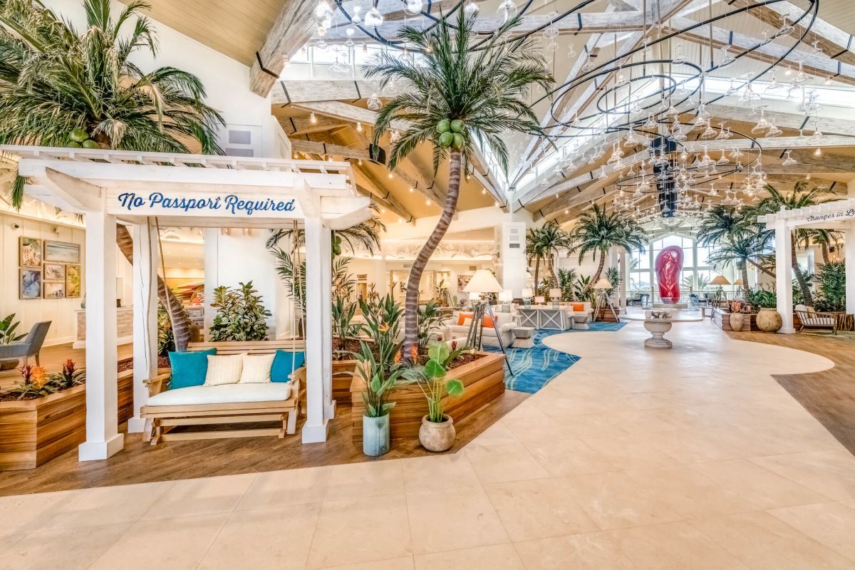 Margaritaville Resort Orlando hotel lobby with tropical decor.