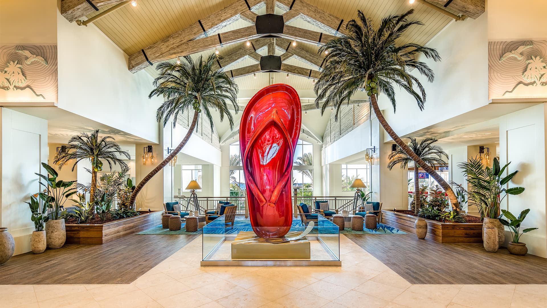 A giant flip flop sculpture at the center of the Margaritaville Resort Orlando hotel lobby.