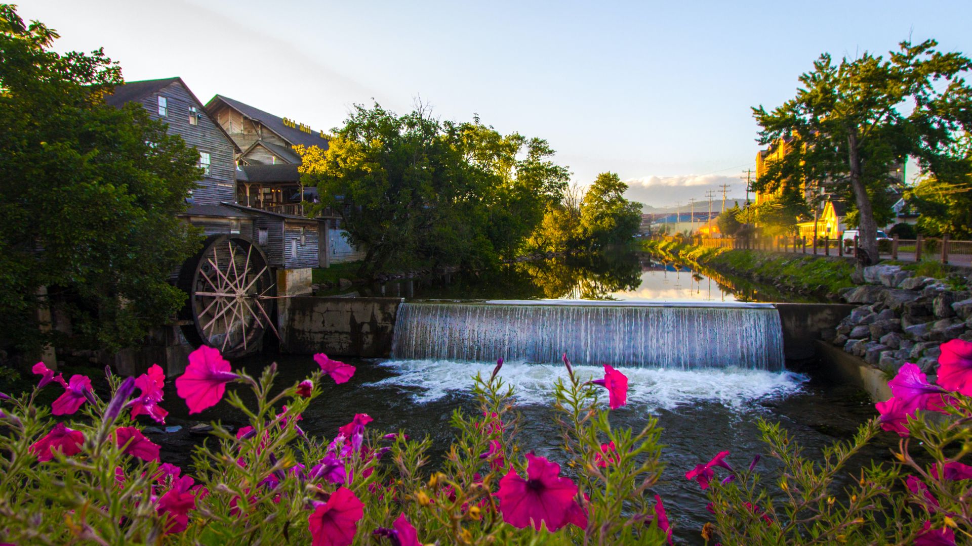 Old Mill Waterfall with Blooming Flowers Pigeon Forge TN Attractions