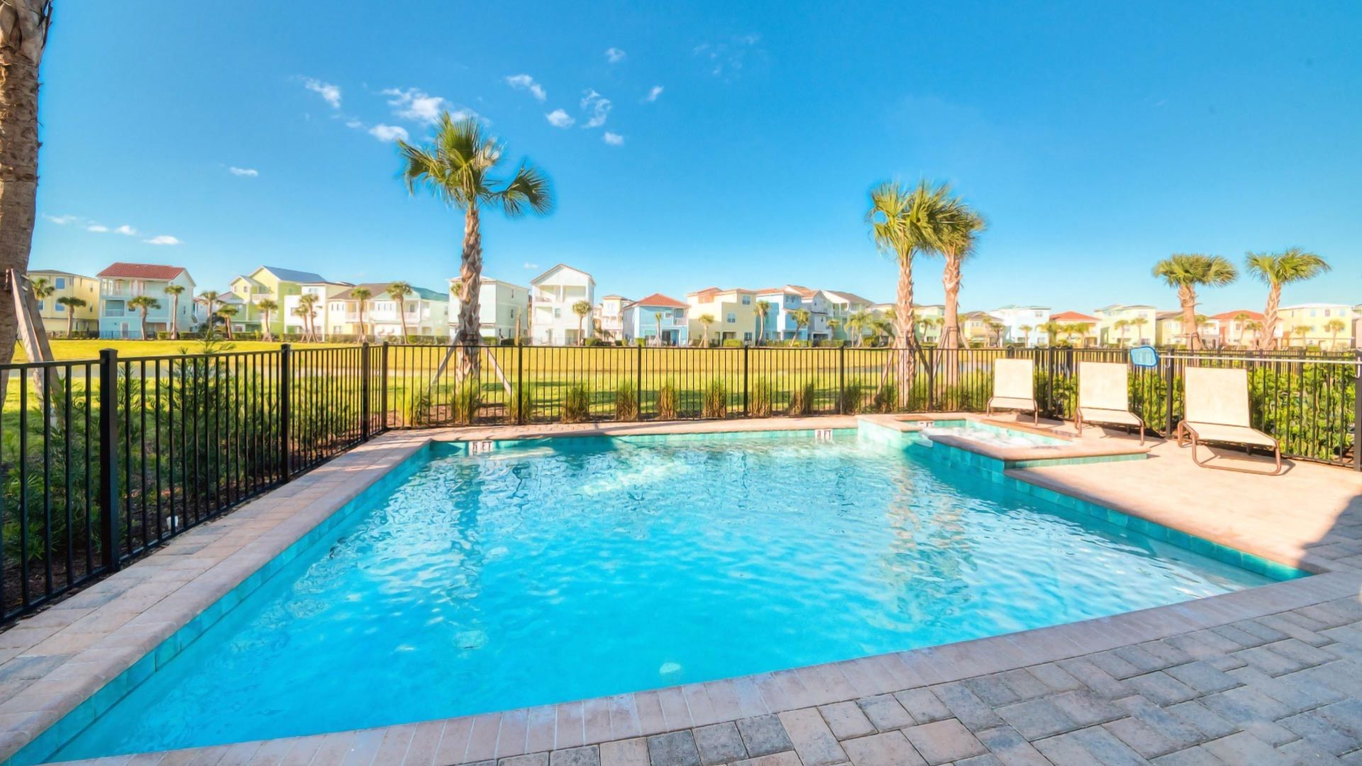 Private Pool And Hot Tub Of A 7-bedroom Cottage With View Of Row Of Margaritaville Resort Orlando Cottages.