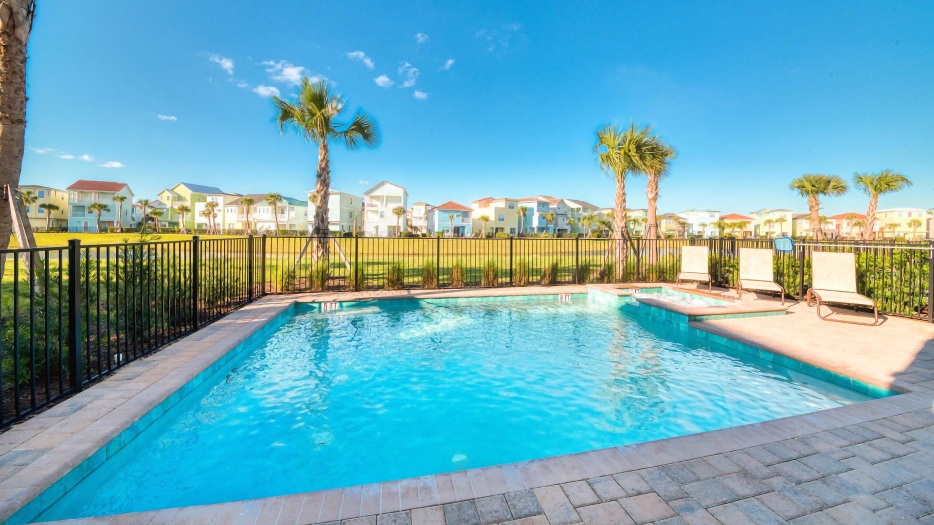 Private Pool And Hot Tub Of A 7-bedroom Cottage With View Of Row Of Margaritaville Resort Orlando Cottages.