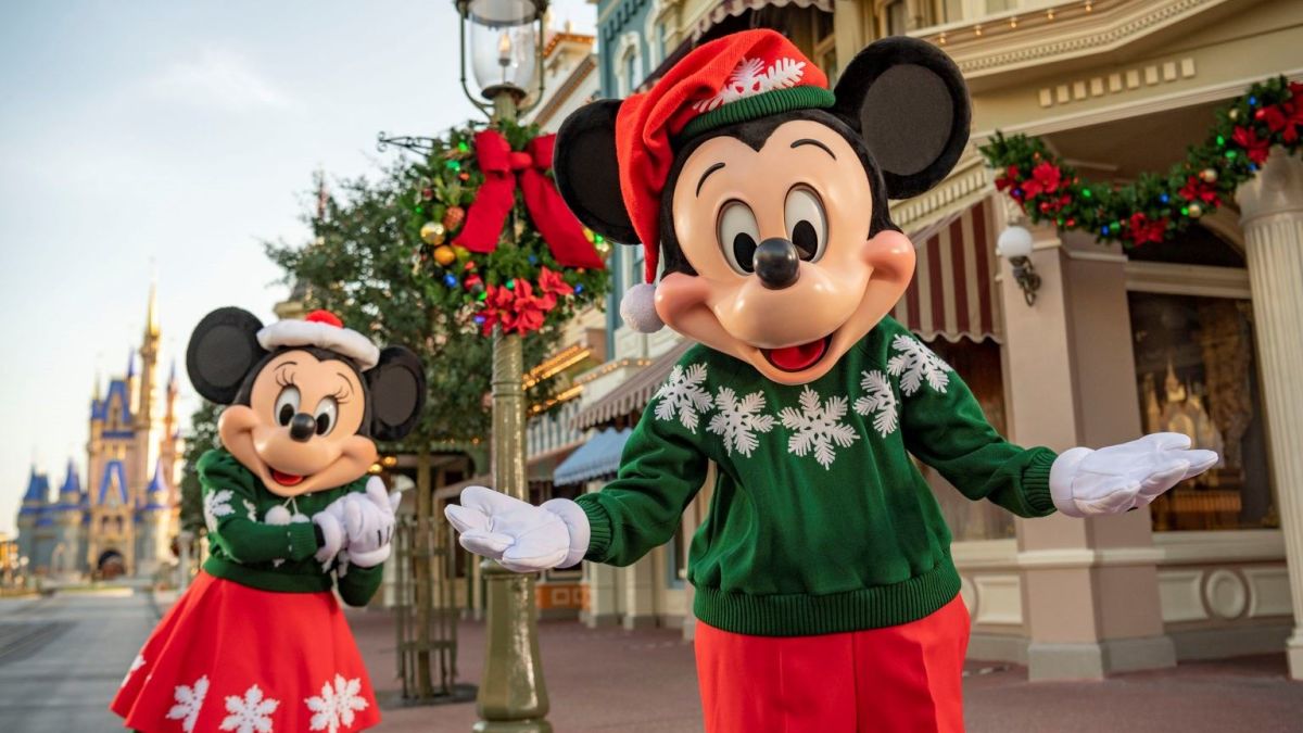 Mickey Mouse and Minnie Mouse wearing holiday attire