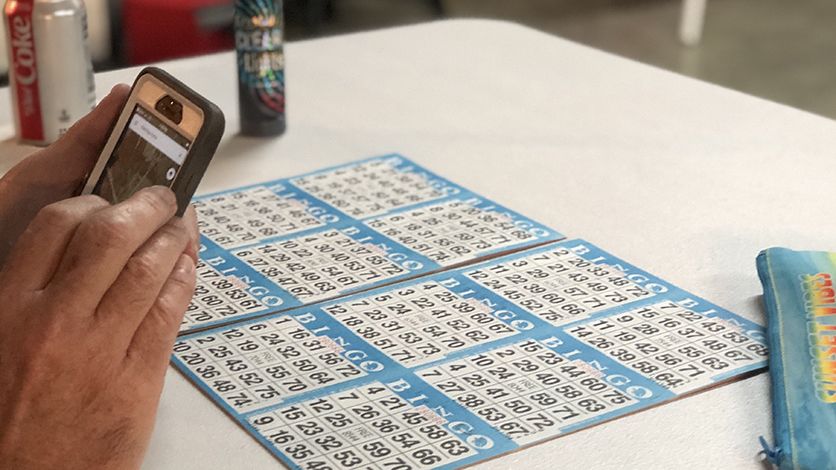 Bingo cards laid out on a table