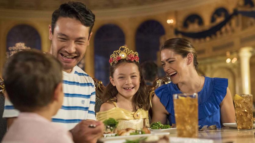 Family enjoying a dinner at Be Our Guest Restaurant at the Magic Kingdom