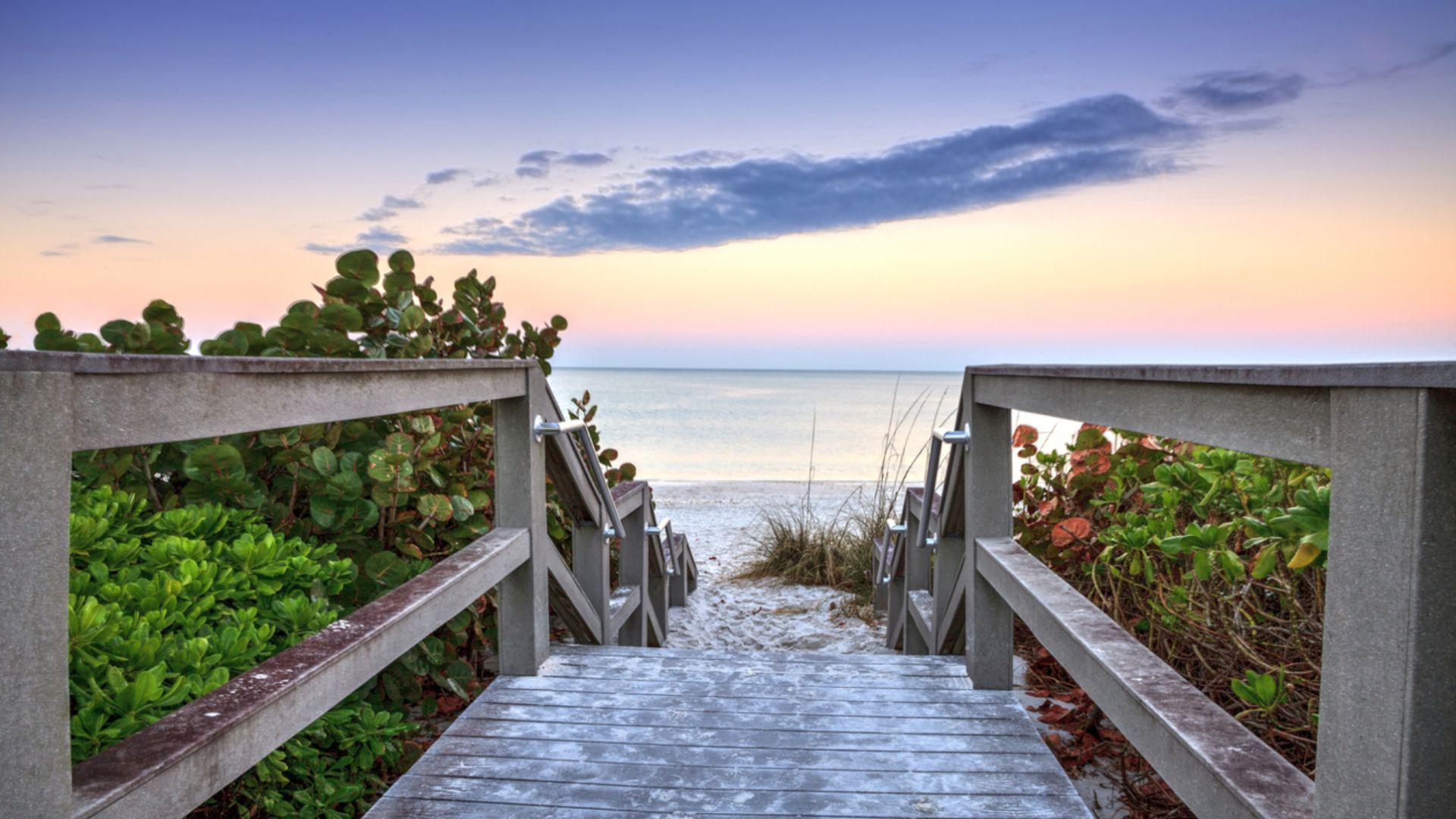 A Wooden Walkway To A Beach