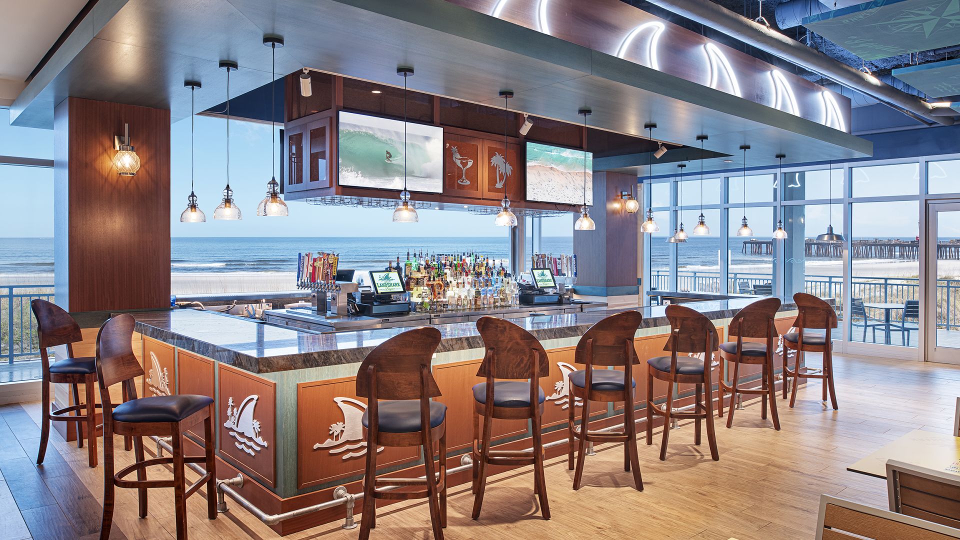 A Inside Bar Facing the Ocean with Barstools