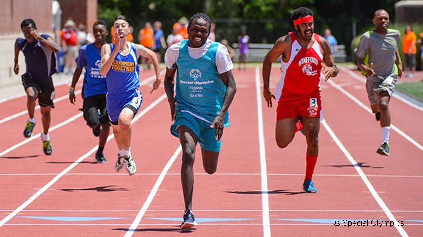 Athletes running on a track
