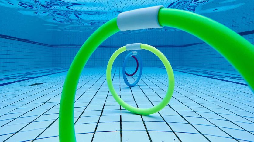 Ring toys underwater in a pool